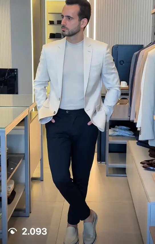 Homem vestido em terno sob medida pela JR Just Right